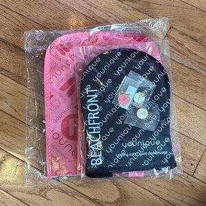 Younique gift 🎁 bag and tanning mitt and 3 charms
